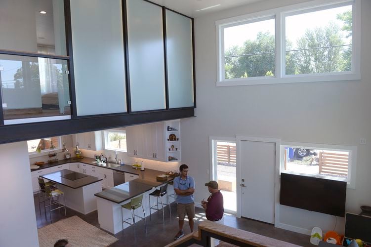 (Al Hartmann  |  The Salt Lake Tribune)
Open kitchen and living room area in one of the new energy efficient Living Zenith homes at 1172 S. 400 East, Salt Lake City. The five homes are built tight with high insulation materials which use very little energy for heating and cooling. Aug. 10, 2017.
