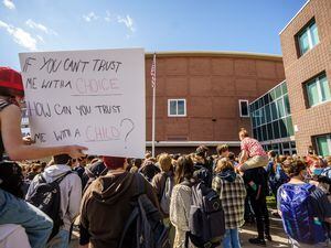 (Trent Nelson  |  The Salt Lake Tribune) Students at Highland High School walk out in support of abortion rights, in Salt Lake City on Thursday, May 12, 2022.