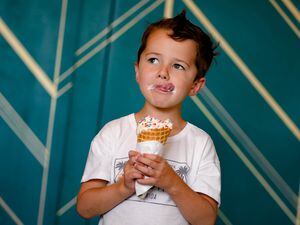 (Francisco Kjolseth | The Salt Lake Tribune) Henry Plumb, 4, enjoys a scoop of cake batter ice cream with sprinkles at Cloud Ninth Creamery at 928 E. 900 South in Salt Lake City on Tuesday, May 31, 2022.