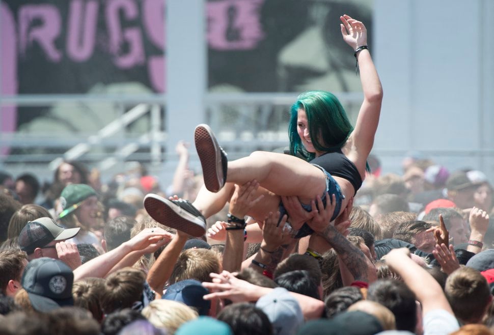 Woman stripped crowd surfing