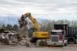 (Bethany Baker | The Salt Lake Tribune) Crews load debris from the demolished Sizzler restaurant near Sugar House Park into trailers in Salt Lake City on Wednesday, April 17, 2024.