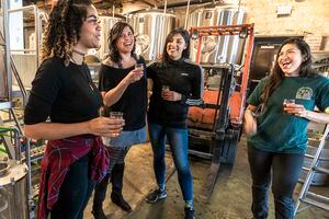 (Leah Hogsten | The Salt Lake Tribune) Left to right: Shyree Rose, Stephanie Biesecker, Melissa Diaz and Mel Dahud, all members of the Brown Gradient Beer Wenches — women of color who work at local breweries — talk at Bewilder Brewing Company about their love of beer and how they got into the industry.