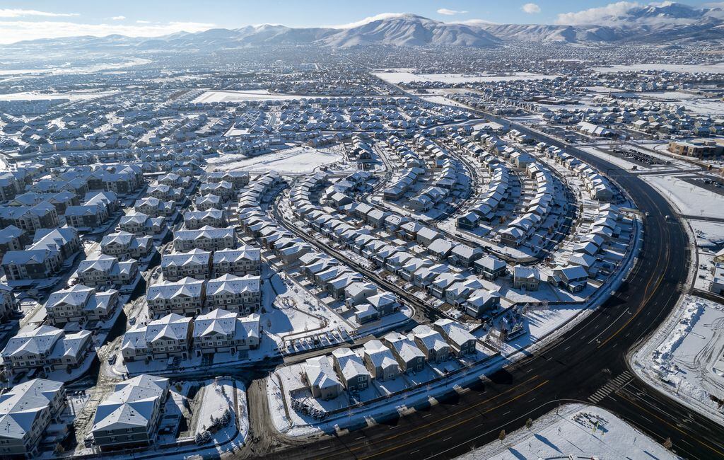 (Trent Nelson | The Salt Lake Tribune) Fresh snow on homes in Herriman on Thursday, Dec. 8, 2022. As its population continues to rise, Utah is convening a sweeping "statewide conversation on growth," designed to gauge public sentiment on issues such as housing, water, transportation and quality of life.