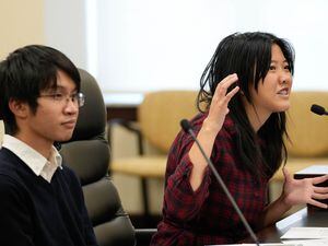 (Francisco Kjolseth | The Salt Lake Tribune) Anh Khoa Le, left, and Joyce Wang, both students at Skyline High School and members of the Utah Attorney General Youth Advisory Committee present a possible bill revision regarding digital safety and an improved school curriculum. The students spoke during the Digital Wellness, Citizenship, and Safe Technology Commission meeting at the Utah Capitol on Tuesday, Nov. 15, 2022. 