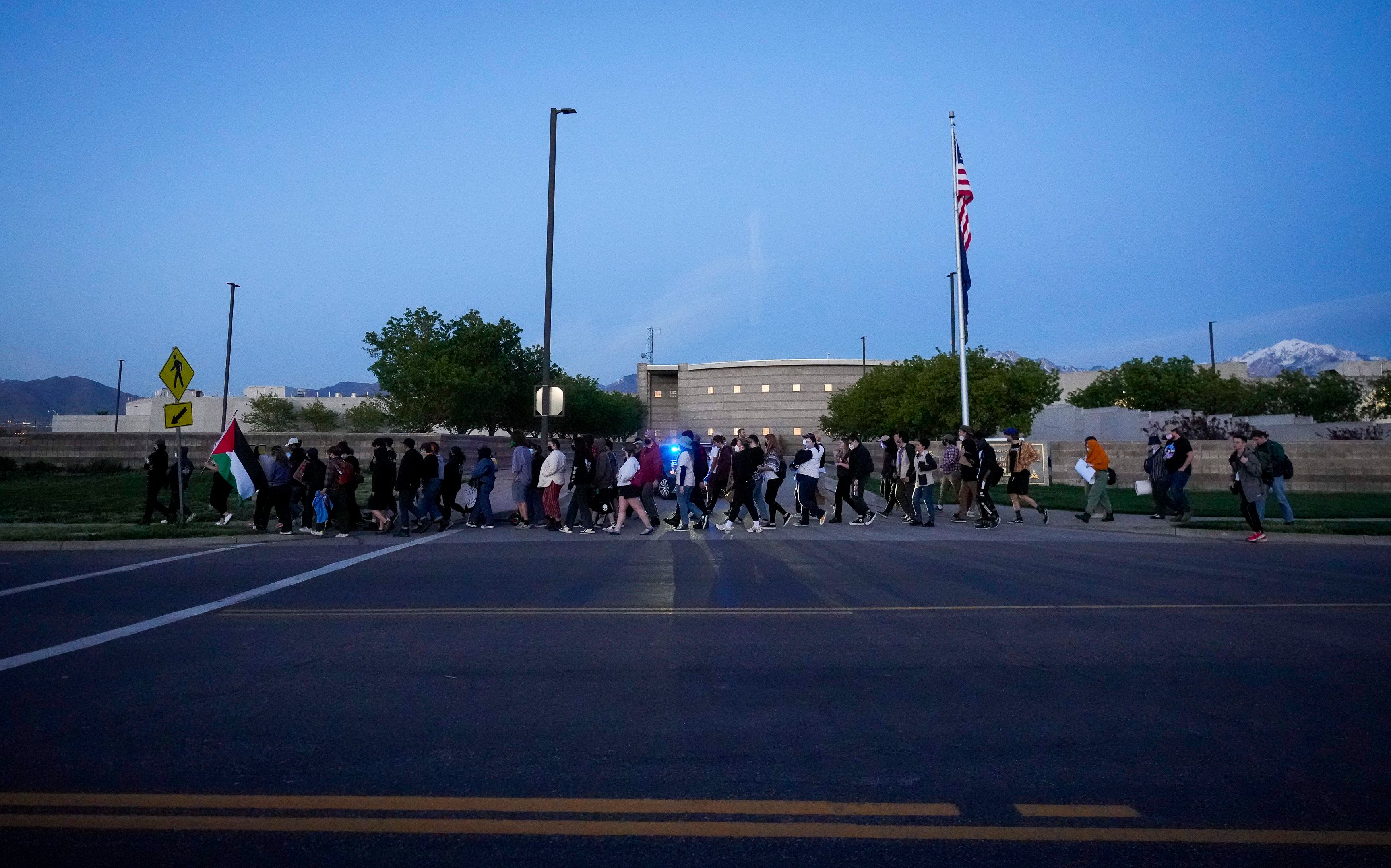 (Bethany Baker | The Salt Lake Tribune) A group of protesters leave a pro-Palestine rally at the Salt Lake County Metro Jail in South Salt Lake on Tuesday, April 30, 2024.