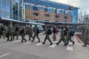 (Erin Alberty | The Salt Lake Tribune)  A U.S. Navy medical team enters University of Utah Hospital on March 2, 2022. The team will help hospital staff with a backlog of about 500 surgeries that were delayed during the coronavirus pandemic.
