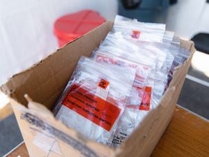 (Rachel Rydalch | The Salt Lake Tribune) A box of coronavirus tests are pictured at a new testing site on Guardsman Way in Salt Lake City on Thursday, Feb. 3, 2022.