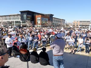 (Chris Samuels | The Salt Lake Tribune) Union officials lead Rio Tinto employees and supporters at a rally outside the company’s office in South Jordan, Friday, March 25, 2022, in support of a new contract.