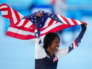 (Trent Nelson  |  The Salt Lake Tribune) Erin Jackson (USA) celebrates winning the gold medal in the speedskating women's 500m at the 2022 Winter Olympics in Beijing on Sunday, Feb. 13, 2022.