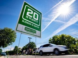 (Francisco Kjolseth | The Salt Lake Tribune) A “20 Is Plenty” sign is placed on the lawn of a home near 300 E. 1800 South on Friday, June 4, 2021, as part of a campaign by Sweet Streets Salt Lake City to get the city to lower its default speed limit.