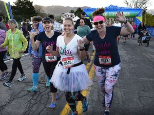 (Scott Sommerdorf | The Salt Lake Tribune)
Costumes, like these worn by runners in the Salt Lake City Marathon in 2018, are  strongly encouraged in the Rock 'n' Roll Race Series. The first Rock 'n' Roll half marathon and 5K in Utah is scheduled to be held Aug. 18-19, 2023.