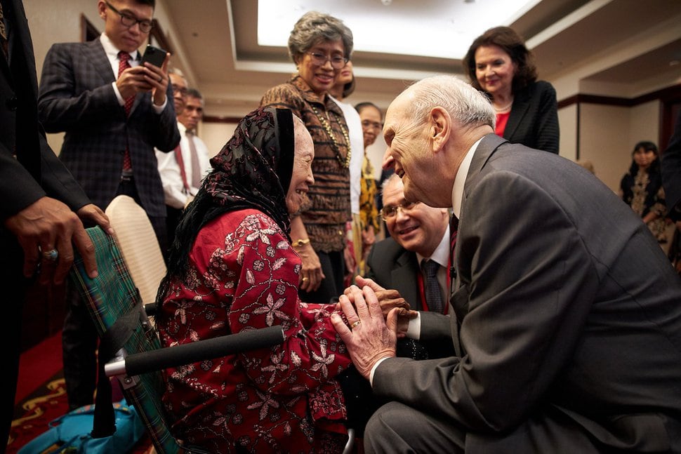 (Photo courtesy of The Church of Jesus Christ of Latter-day Saints) President Russell M. Nelson greets a member in Jakarta.