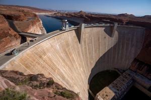 (Rick Egan | The Salt Lake Tribune) The Glen Canyon Dam, on the Colorado River in northern AZ, on Tuesday, Aug. 3, 2021.