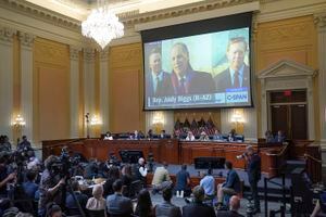 (Demetrius Freeman | Pool) A video of Andy Biggs, R-Ariz., is shown on a screen, as the House select committee investigating the Jan. 6 attack on the U.S. Capitol continues to reveal its findings of a year-long investigation, Thursday, June 23, 2022, at the Capitol in Washington.