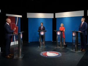 (Trent Nelson  |  The Salt Lake Tribune) Andrew Badger, Tina Cannon, and Blake Moore at the U.S.. House 1st District Republican primary debate in Salt Lake City on Thursday, June 2, 2022. At left is moderator Thomas Wright.