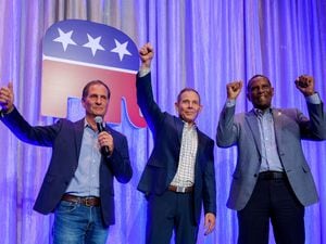 (Trent Nelson  |  The Salt Lake Tribune) Reps. Chris Stewart, John Curtis, and Burgess Owens at the Utah Republican Party election night party at the Hyatt Regency in Salt Lake City on Tuesday, Nov. 8, 2022.