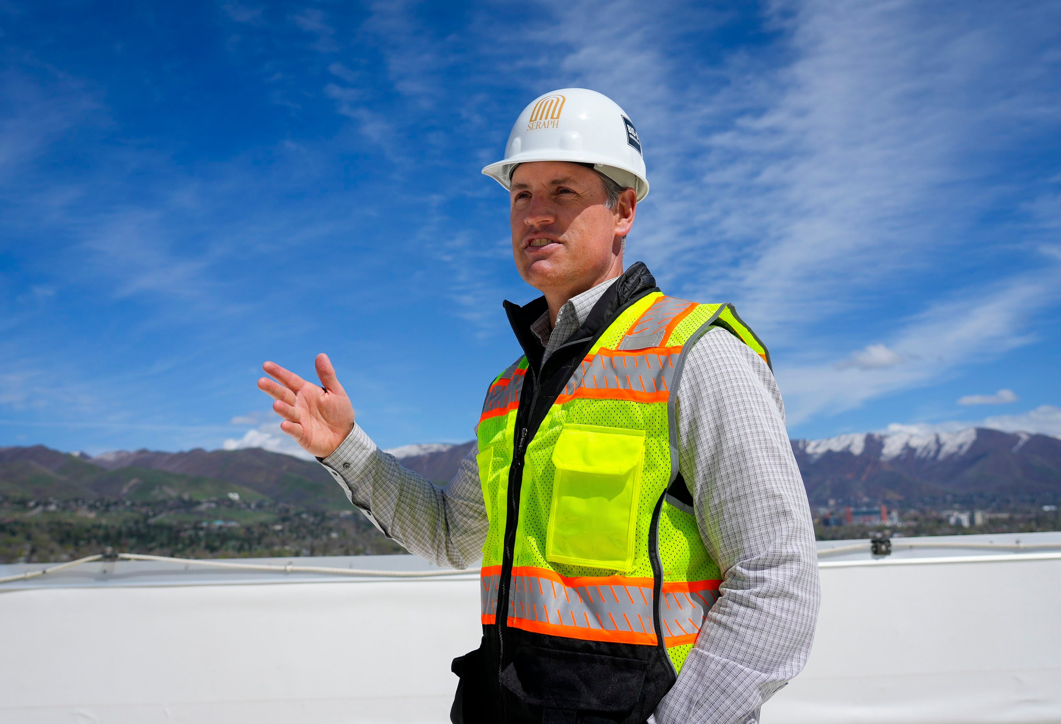 (Bethany Baker | The Salt Lake Tribune) Dusty Harris, director of the Salt Lake City Hines office, gives a tour as the Texas-based developer works on an office-to-residential conversion of University Club Tower on South Temple in Salt Lake City on Wednesday, April 17, 2024.