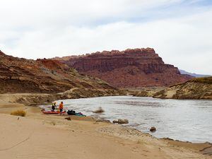 (Zak Podmore | The Salt Lake Tribune) The Colorado River carves through sediment that was deposited in Lake Powell when the reservoir was higher, April 10, 2022.