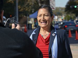 FILE - In this Nov. 3, 2020, file photo, Democratic Congresswoman Deb Haaland, N.M.-1st Dist., does a PSA for her Twitter account in downtown Albuquerque, N.M. Internet access, health care and basic necessities like running water and electricity within Indigenous communities have long been at the center of congressional debates. But until recently, Congress didn't have many Indigenous members who were pushing for solutions and funding for those issues. Hope is growing after the Native delegation in the U.S. House expanded by two on Election Day joining four others that were reelected. (Jim Thompson/The Albuquerque Journal via AP, File)
