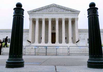 (Jose Luis Magana | AP) The U.S. Supreme Court is seen early Tuesday, May 3, 2022 in Washington.