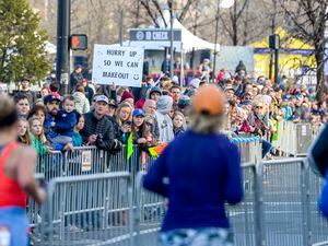 Leah Hogsten  |  The Salt Lake Tribune  Family and fans cheer on runners, skaters and cyclists at the Salt Lake City Marathon, Saturday April 13, 2019. 
