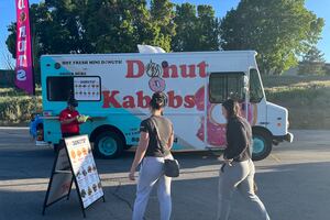 (Stefene Russell  |  The Salt Lake Tribune) The Donut Kabobs truck, taking part in the Utah Food Truck League's meet-up in Murray Park, Tuesday, May 24, 2022.