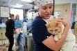 (Francisco Kjolseth | The Salt Lake Tribune) Dr. Rachel Walton cradles a cat named Spot as she waits for the anesthesia to take effect before taking a few skin biopsies on Friday, Oct. 28, 2022. Veterinarians, perhaps unexpectedly, are frequently limited in their employment options by noncompete clauses.