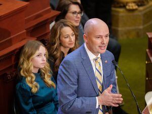(Trent Nelson  |  The Salt Lake Tribune) Utah Gov. Spencer Cox delivers his State of the State address at the Capitol building in Salt Lake City on Thursday, Jan. 19, 2023. At rear are EmmaKate and Abby Cox, and Lt. Gov. Deidre Henderson.