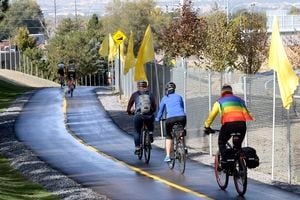 (Al Hartmann  |  Tribune file photo) 	
In this Oct. 17, 2017, file photo, bike riders take their first tour down a long section of Parley’s Trail from Tanner Park towards Sugar House Park. The trail stays above and parallels I-80 and uses bridges to get to Sugar House Park.
