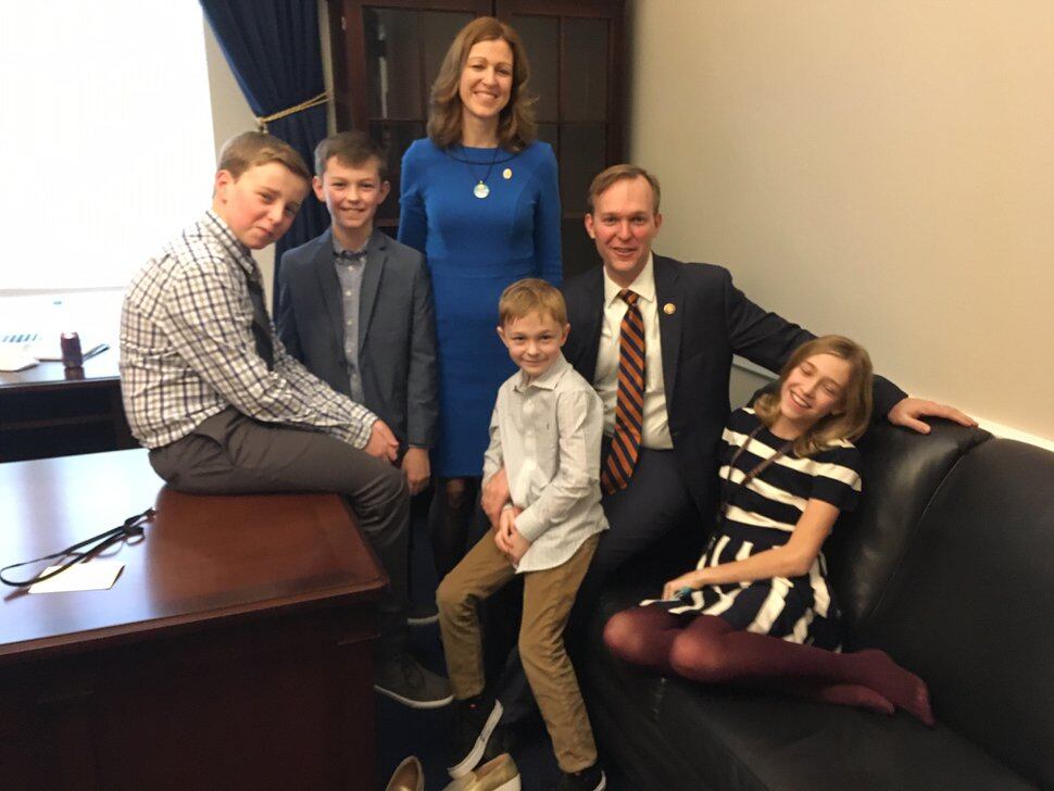 (Peter Urban | Special to The Salt Lake Tribune) Congressman Ben McAdams poses with his family in his new House office.