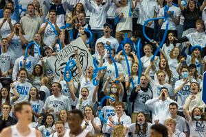 Rick Egan | The Salt Lake Tribune)  BYU basketball fans cheer as the Cougars extend their lead in the final minutes of a game against the San Diego Toreros at the Marriott Center on Jan. 20, 2022.