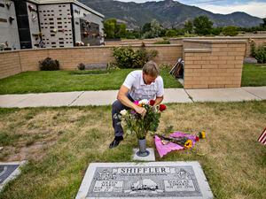 (Kim Raff | The New York Times) Doug Shiffler visits his wife's grave in Ogden, Utah, July 14, 2022. Shiffler is one of hundreds of people suing Philips Respironics after his wife died of lung cancer with in a year of diagnosis.