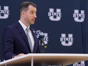 (Eli Lucero | Herald Journal) Danny Sprinkle speaks at a press conference where he was introduced as the new basketball coach at Utah State University on Monday in Logan.