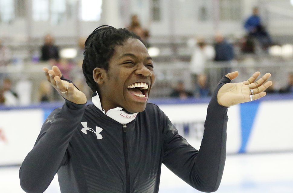 Maame Biney reacts during a medal ceremony after winning women's 500-meter A final race during the U.S. Olympic short track speedskating trials Saturday, Dec. 16, 2017, in Kearns, Utah. (AP Photo/Rick Bowmer)