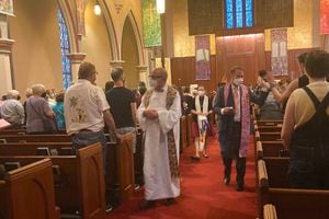 (Peggy Fletcher Stack | The Salt Lake Tribune)
Clergy from several Utah congregations greet worshippers at the Interfaith Pride service at Salt Lake City's First Baptist Church on Thursday, June 2, 2022.