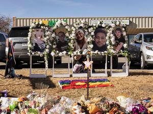 (Joanna Kulesza | The New York Times)

A makeshift memorial stands in front of Club Q, where a mass shooting on Saturday night left five people dead and 18 people injured, in Colorado Springs, Colo. on Tuesday, Nov. 22, 2022.