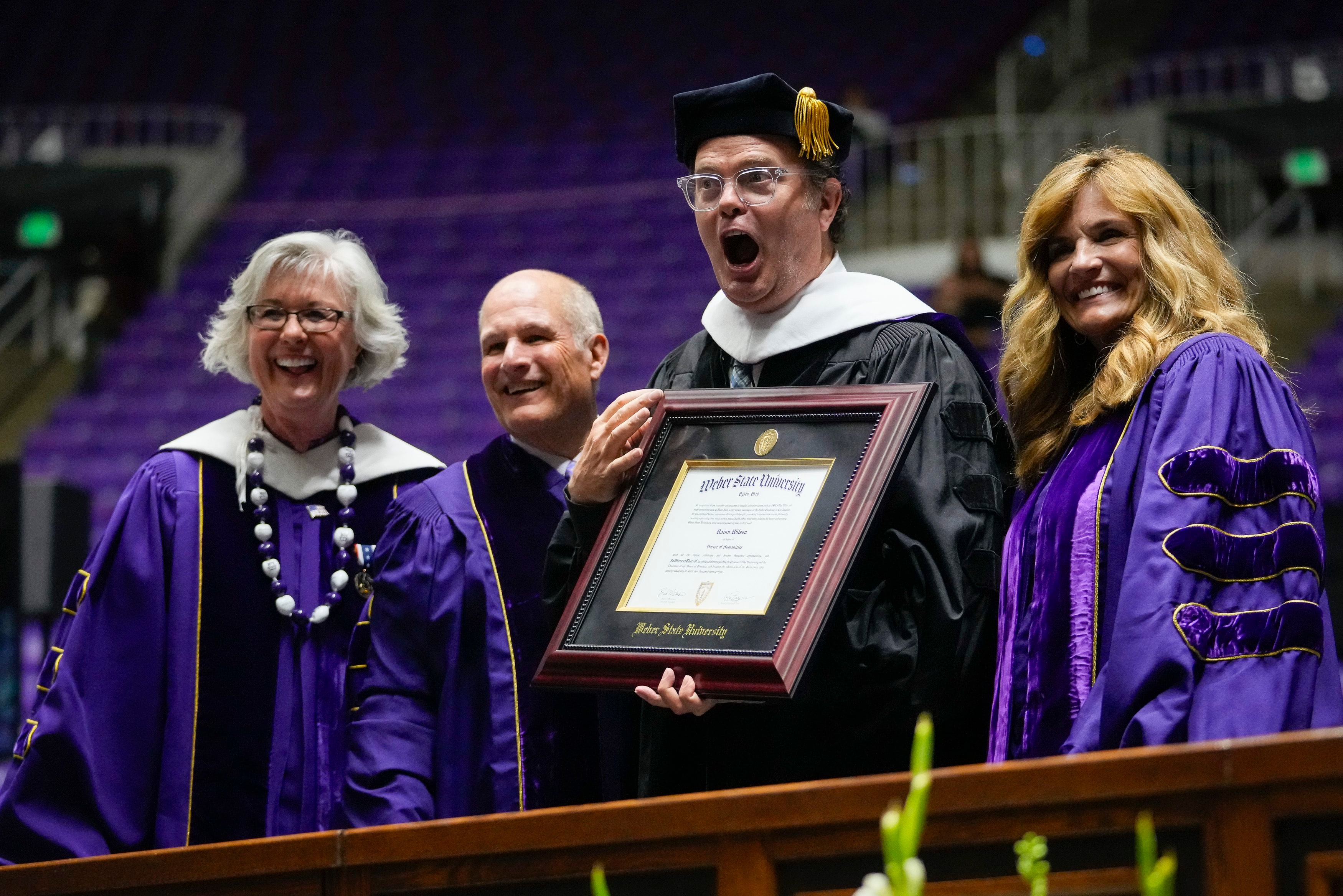 (Bethany Baker  |  The Salt Lake Tribune) Celebrity Rainn Wilson reacts as he receives an honorary degree during the graduation ceremonies at Weber State University in Ogden on Friday, April 26, 2024.