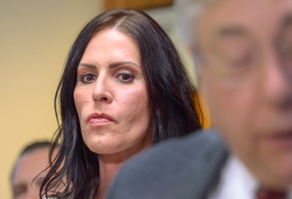 Leah Hogsten | The Salt Lake Tribune Brenda Mayes, left, joined her attorney Robert Sykes, right, during a press conference announcing the lawsuit they filed, Tuesday, May 7, 2019 against the Davis School District, accusing a bus driver of racial discrimination against her son.