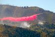 (Leah Hogsten  |  The Salt Lake Tribune )  An air tanker air drops fire retardant on the Pole Creek fire in September 2018.  The Forest Service's decision to not immediately put out the Pole Creek and Bald Mountain fires is now the subject of a lawsuit filed by property owners seeking damages from the federal government.