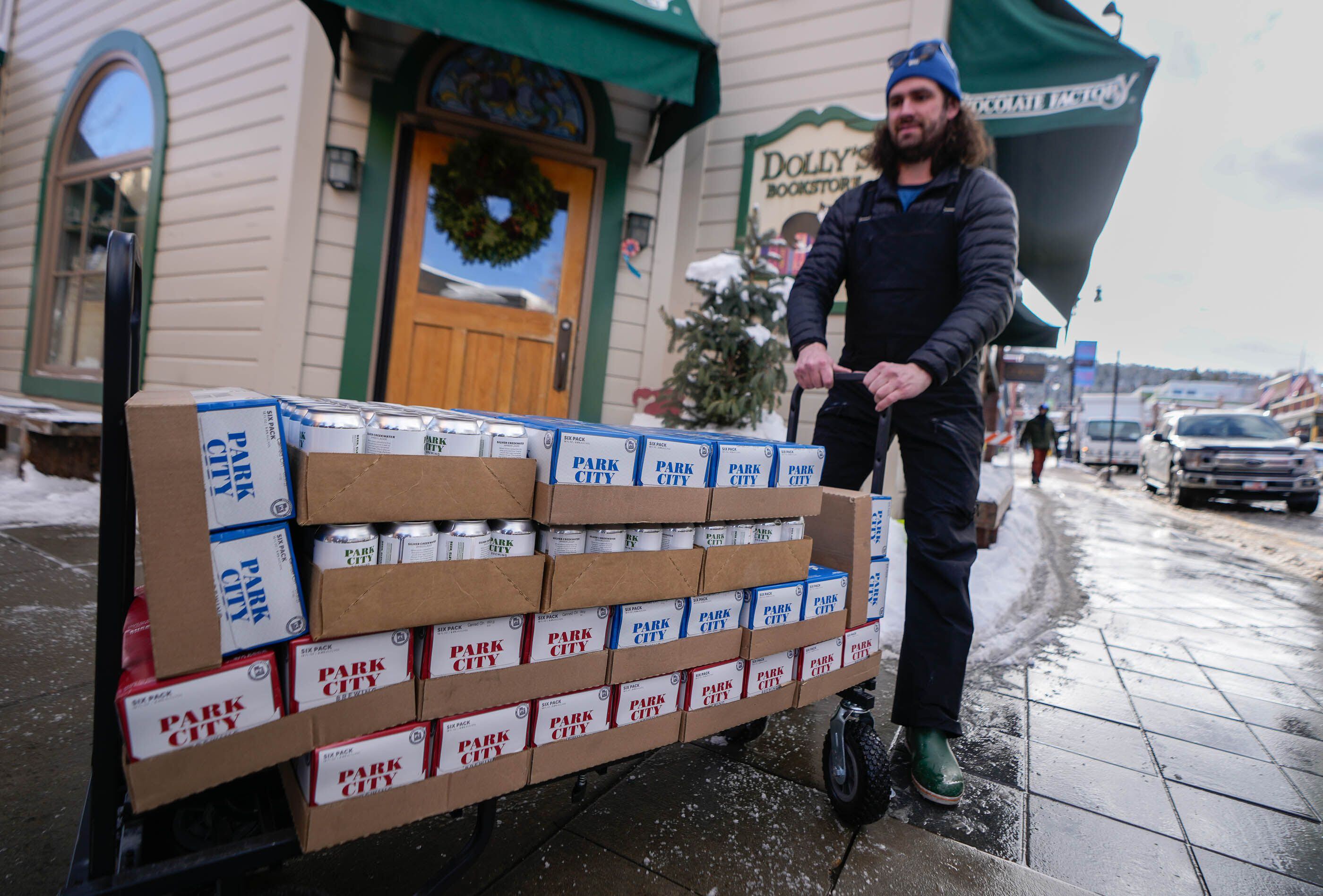 (Francisco Kjolseth  |  The Salt Lake Tribune) Troy Higgins makes a delivery along Main Street in Park City on opening-day of the Sundance Film Festival on Thursday, Jan. 18, 2024.