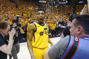 Utah Jazz guard Donovan Mitchell (45) celebrates after the team's 96-91 victory over the Oklahoma City Thunder during Game 6 of an NBA basketball first-round playoff series Friday, April 27, 2018, in Salt Lake City. The Jazz won the series. (AP Photo/Rick Bowmer)