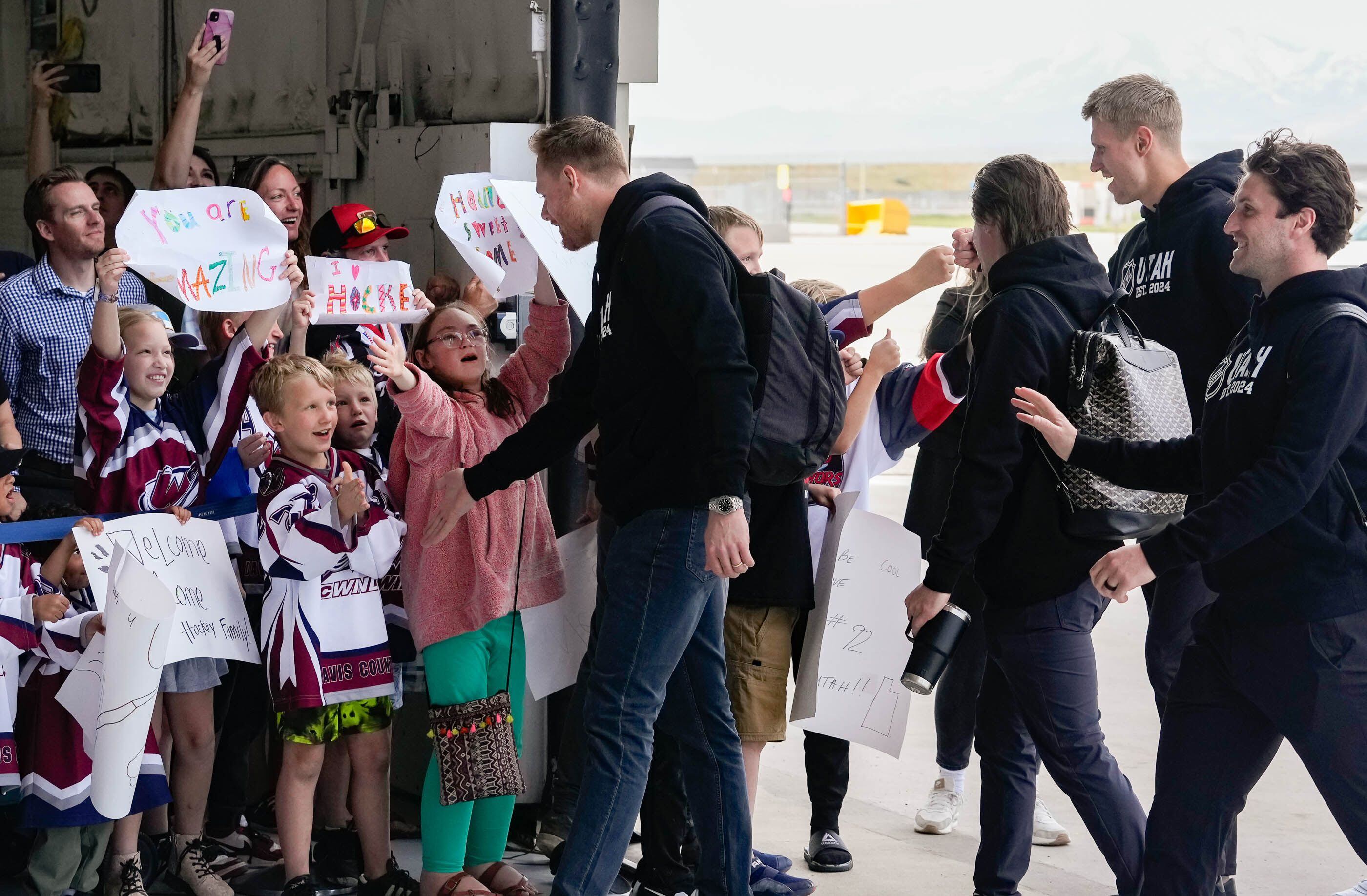 (Francisco Kjolseth  |  The Salt Lake Tribune) Utah’s new NHL hockey team arrives at the airport in Salt Lake City to the cheers of fans on Wednesday, April 24, 2024.