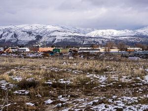 (Rick Egan | The Salt Lake Tribune) The site of Salt Lake City’s old landfill, pictured on Jan. 18, 2023, is to be developed into a “tiny home” community called The Other Side Village. The developers plan to build an 8-acre pilot phase this year on the least contaminated corner of the city property at 1850 W. Indiana Ave. The Other Side Academy must first remediate the site.