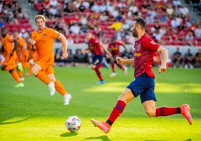 (Isaac Hale | Special to The Tribune) Real Salt Lake forward Justin Meram (9) drives the ball upfield during a MLS game between Real Salt Lake and Houston Dynamo FC at Rio Tinto Stadium in Sandy on Saturday, June 26, 2021.