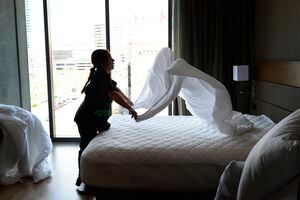 (Scott Sommerdorf | The Salt Lake Tribune)Leticia Longoria changes a corner room's linen at the new AC Hotel in downtown Salt Lake City, Friday, April 20, 2018. Hotels and other lodging properties had 11 percent more employees last month than in the previous March, helping to lead Utah to a 3.3 percent year-over-year job growth rate, the best in the nation.