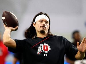 (Steve Marcus | AP) Utah quarterback Cameron Rising warms up before the Pac-12 Conference championship NCAA college football game against Southern California, Friday, Dec. 2, 2022, in Las Vegas.