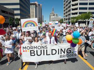 (Rick Egan  |  The Salt Lake Tribune) Members of Mormons Building Bridges march in the Utah Pride Parade in 2018.