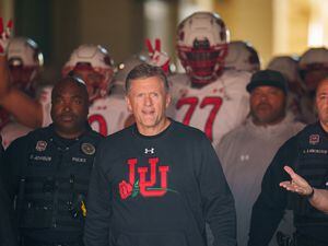 (Trent Nelson  |  The Salt Lake Tribune) Kyle Whittingham leads his team onto the field as the Utah Utes face the Ohio State Buckeyes at the Rose Bowl in Pasadena, Calif., on Saturday, Jan. 1, 2022.