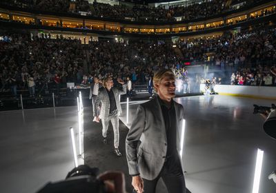 (Rick Egan | The Salt Lake Tribune) Players with the Utah NHL team enter the Delta Center at an event to celebrate Utah's new hockey franchise on Wednesday, April 24, 2024.