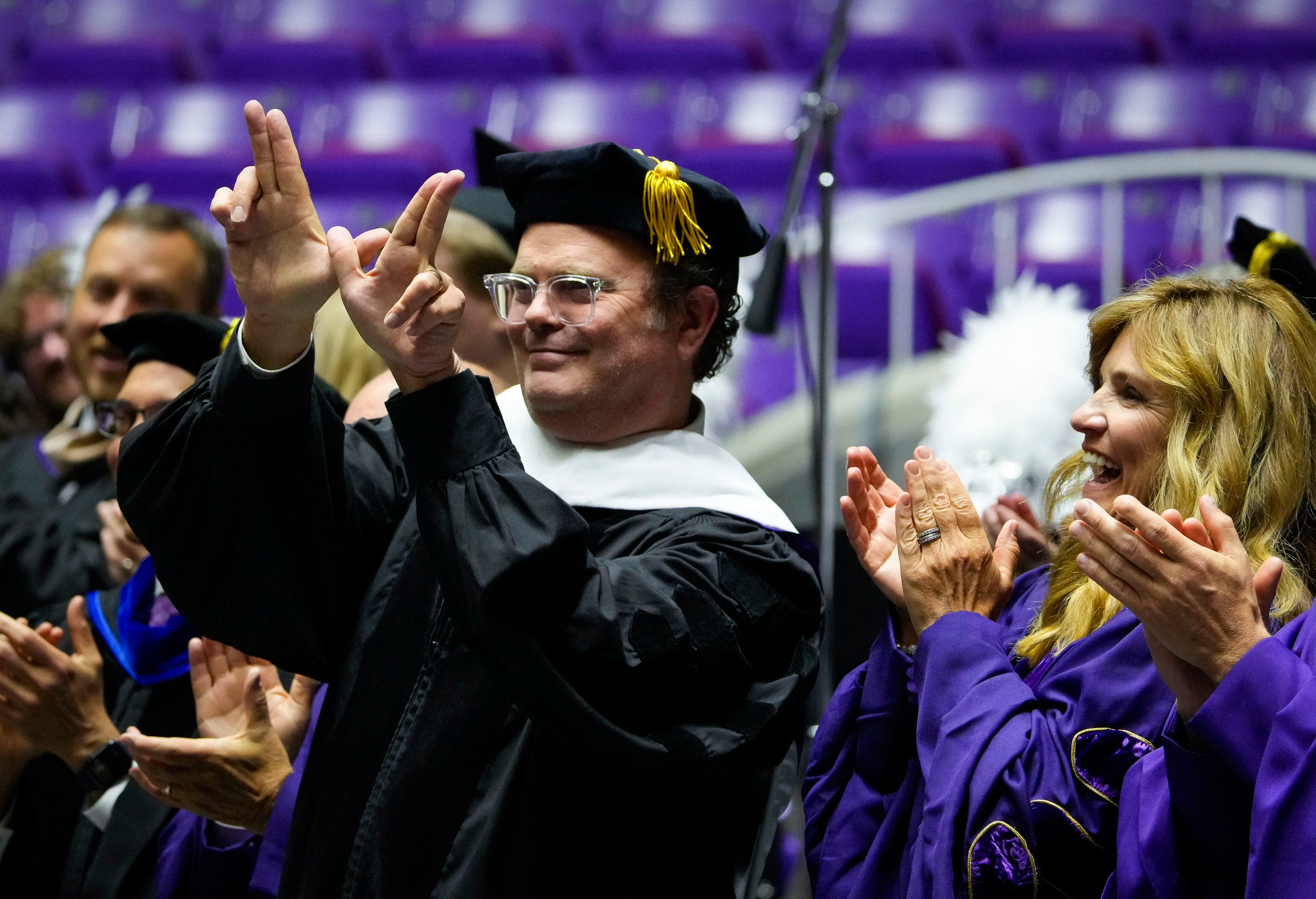 (Bethany Baker  |  The Salt Lake Tribune) Celebrity Rainn Wilson holds up the "W" sign with his hands after he delivers the commencement address at the graduation ceremonies at Weber State University in Ogden on Friday, April 26, 2024.